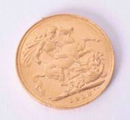 A George V full gold sovereign dated 1918 (M).