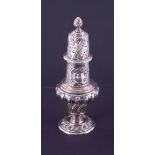 A silver heavy gauge embossed sugar caster with swirl base, open cartouche, with acorn style finial,