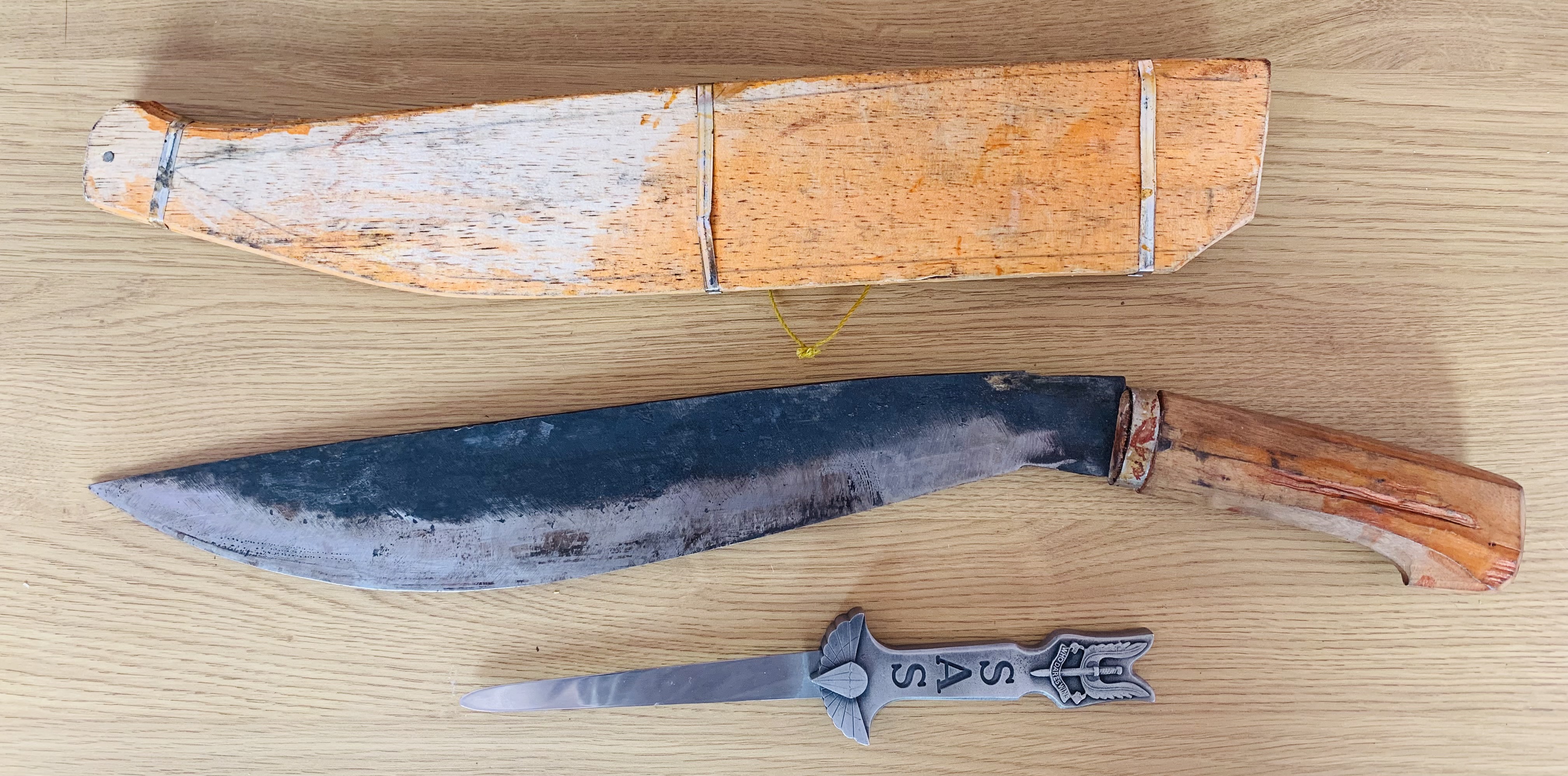 A Filipino bolo style blade, it comes with a 33.5 cm long blade, used
