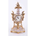 A Victorian & Albert Museum reproduction 'Marie-Antoinette' clock in porcelain with gilt
