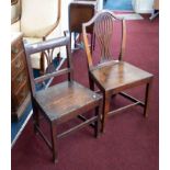 Two 19th Century oak framed side chairs with hard seats.