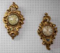 Two similar mid 20th century, Swedish gilt carved wood artel style Wall Clocks from Westerstrand,