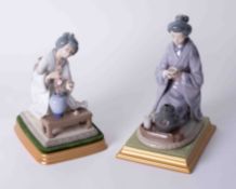 Two Oriental figure groups including lady making tea on stands, approx. 24cm, all boxed.