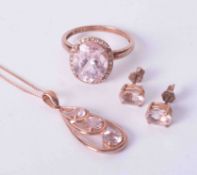 A modern 9ct rose gold suite of jewellery comprising a single stone earring, pendant and a pair of