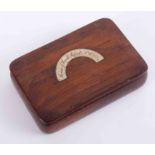 A wood snuff box with inset plaque marked 'House of Lords, burnt October 16th 1834', 11cm x 7cm.