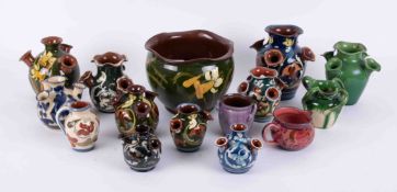 A mixed collection of Devon pottery including Allervale udder jugs, etc (15). The proceeds from this