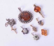 A small collection of silver and other jewellery including amber set pendants (8).