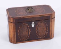 A 19th Century mahogany and inlaid tea caddy with panels of burr walnut, gilt metal finial, height