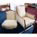 A mahogany framed and upholstered nursing chair together with an early 20th century armchair with