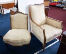 A mahogany framed and upholstered nursing chair together with an early 20th century armchair with