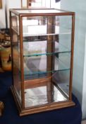 A small Victorian mahogany display cabinet, height 61cm.