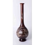 A large 20th century Chinese wood bottle vase decorated with mother of pearl dragon scene, height