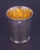 A Georgian silver beaker, gilt lined, indistinct hallmarks, height 9.5cm, 5.39oz