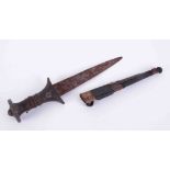 A 19th Century dagger and scabbard (worn).