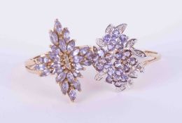 Two 9ct yellow gold cluster rings, one with marquise cut pale tanzanite's and tiny diamonds in a