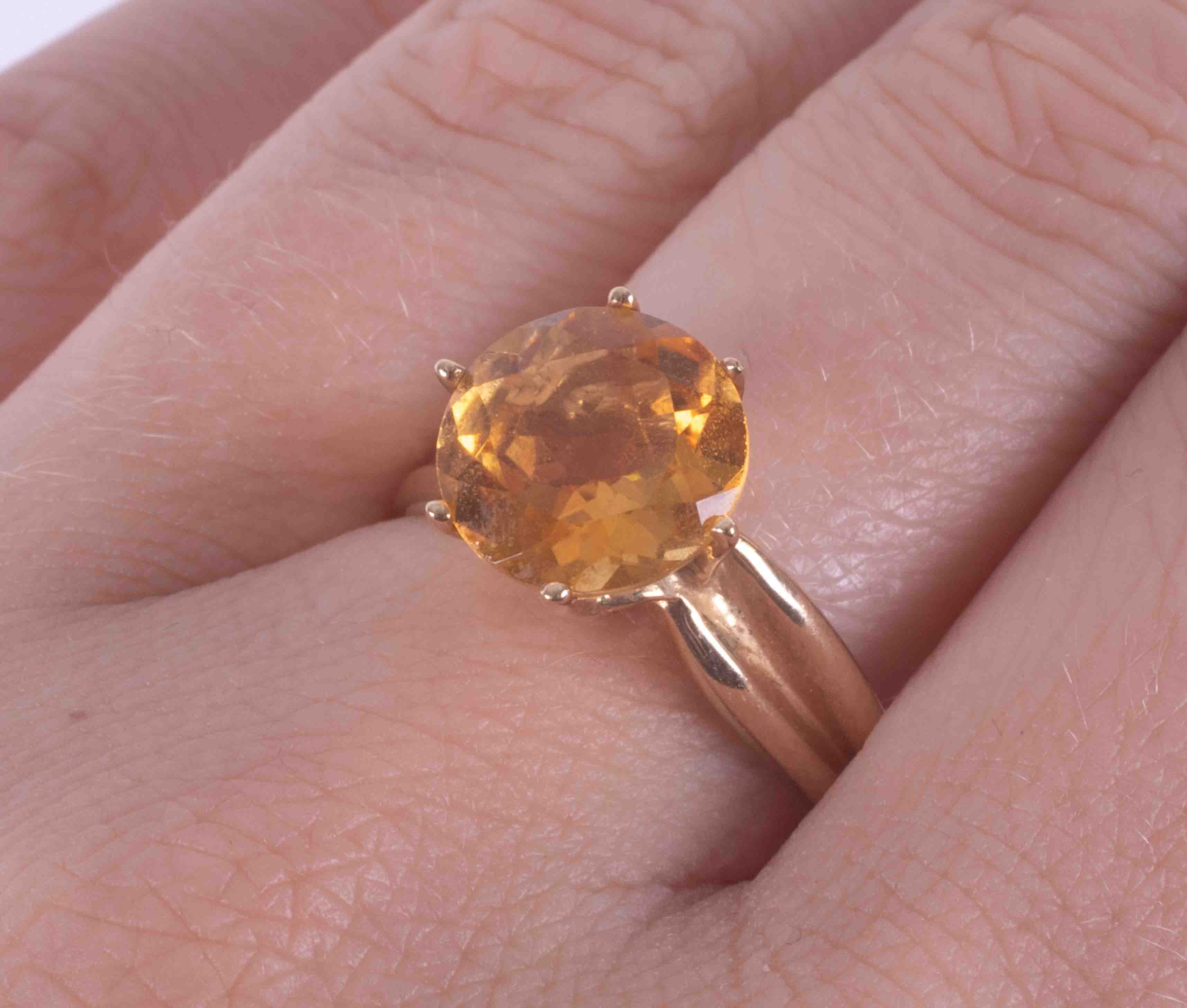 A 9ct yellow gold ring set with a round cut citrine? approx. 3.90 carats, 3.87g, size P. - Image 2 of 2