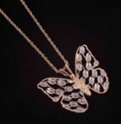 A 9ct yellow gold 18" chain with a 9ct yellow & white gold butterfly pendant, total weight 4.30g.