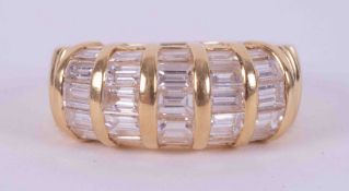 An 18ct yellow gold ring set with approx. 2.00 carats of baguette cut diamonds, colour G-H and SI