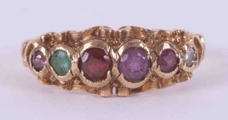 A 9ct yellow gold ring which spells out "Regard" in gemstones, set with ruby, emerald,