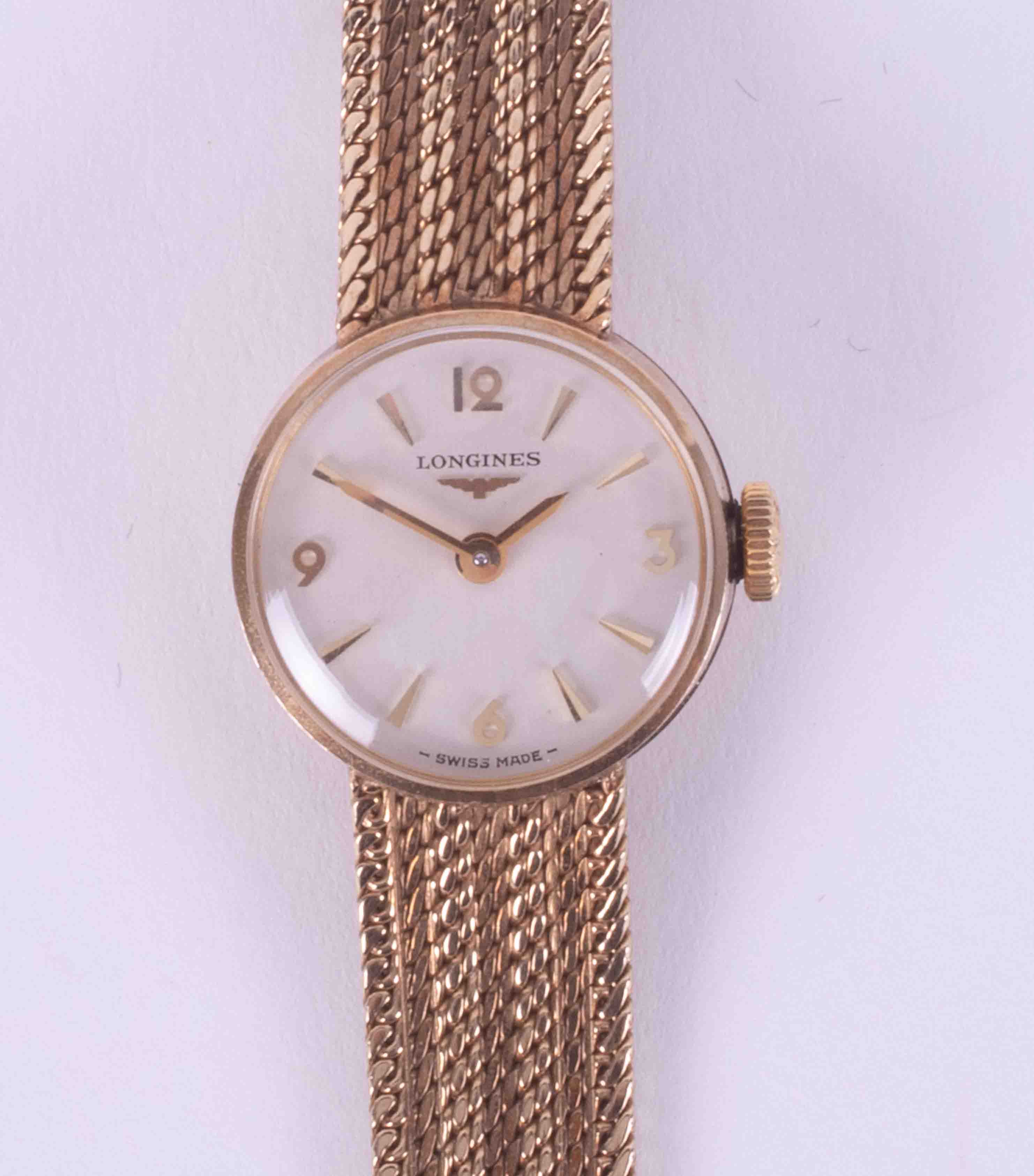 Longines, a 9ct yellow gold ladies cocktail watch woven style bracelet and ladder clasp, 20.89g.