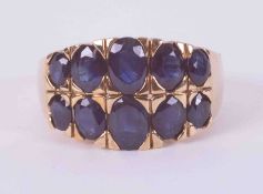 A 9ct yellow gold double row ring set with ten oval cut sapphires, total weight approx. 2.50 carats,