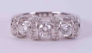 An impressive platinum ring set with approx. 1.00 carat total weight of round brilliant cut