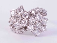 An 18ct white gold double flower cluster ring set with approx. 4.10 carats of round brilliant cut