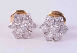 A pair of 18ct yellow & white gold flower cluster earrings set with approx. 2.38 carats of round