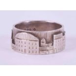 A silver designer mid-century architecture engraved ring possibly by jewellery artist Norman Cherry,