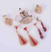 A set of four designer costume jewellery items by Trifari including an ornate paste gem set crown