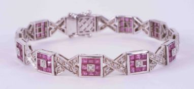 An 18ct white gold Art Deco style line bracelet set with approx. 11 carats of square cut rubies