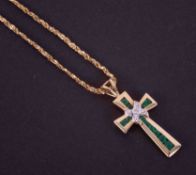 A 14ct yellow gold 16" fancy chain with a 14ct yellow & white gold cross pendant set with round