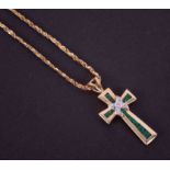 A 14ct yellow gold 16" fancy chain with a 14ct yellow & white gold cross pendant set with round