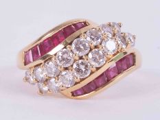 An 18ct yellow gold ring set centrally with two rows of round brilliant cut diamonds, total