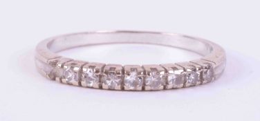 An 18ct white gold half eternity ring set with approx. 0.42 carats of round brilliant cut