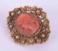 A yellow gold (no hallmarks) coral cameo brooch with pin fitting, 4g, measures approx. 2.8cm x 2.