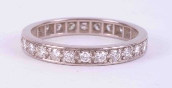 An 18ct white gold? (no hallmark & not tested) full eternity set with small round brilliant cut