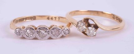 A set of two rings comprising of an 18ct yellow gold & platinum five stone ring set with old cut