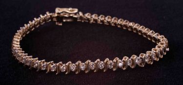 An 18ct yellow gold line bracelet set with 52 round brilliant cut diamonds, approx. total weight 1.