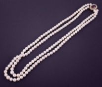 A double row of cultured pearls, ranging from 9.5mm down to 7mm in size and approx. 24" to 25" in