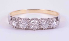 An 18ct yellow gold & platinum (no hallmarks & not tested) five stone ring set with approx. 0.50