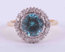 An 18ct yellow gold & platinum cluster ring set with approx. 1.67 carats of blue zircon surrounded