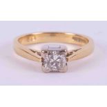 An 18ct yellow & white gold ring set with 0.50 carats of princess cut diamond, colour H-I and SI2