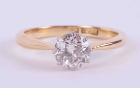 An 18ct yellow gold & platinum solitaire set with approx. 0.65 carats of round brilliant cut