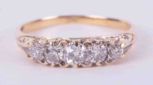 An 18ct yellow gold (no hallmark & not tested) five stone ring set with old round cut