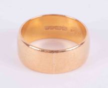 A 22ct yellow gold wedding band, 9.58g, approx. 8mm width, size P 1/2.