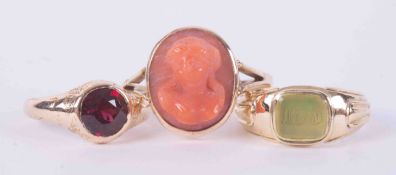 A set of three 9ct yellow gold rings including a 9ct yellow gold cameo ring, 4.00gm, size Q