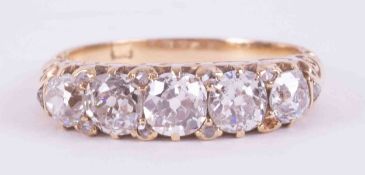 A Victorian 18ct yellow gold ring set with five old round cut diamonds, total weight approx. 1.58