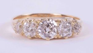 An 18ct yellow gold (no hallmarks) Edwardian ring set with five old round cut diamonds, approx.