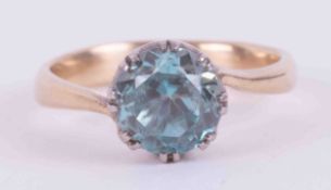 A yellow & white gold ring (no hallmarks but looks to be 9ct) set with a round cut blue zircon